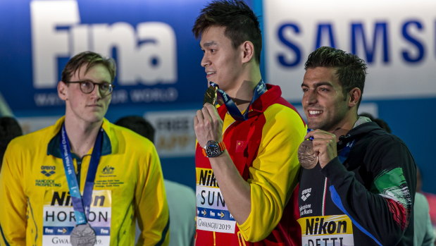 Mack Horton (left) made his point against Sun Yang (centre).