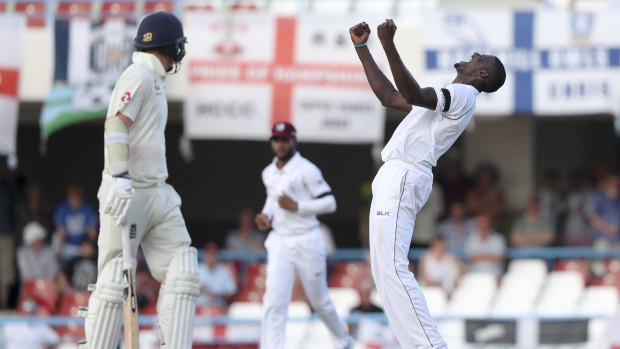 West Indies captain Jason Holder celebrates a wicket, but will miss the next Test because of slow over rates.