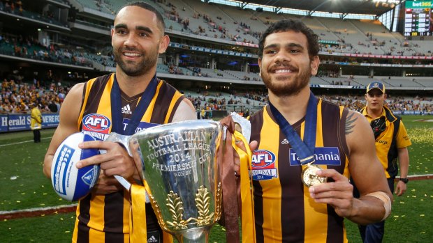 Premiership teammates Shaun Burgoyne and Cyril Rioli.