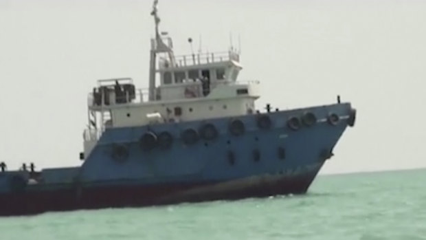 This image shows a ship in the Persian Gulf. Iranian forces seized the ship, which it suspected of carrying smuggled fuel, state media reported.