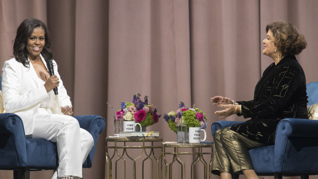 Former first lady Michelle Obama, left, is interviewed by Elizabeth Alexander at Barclays Centre in Brooklyn. 