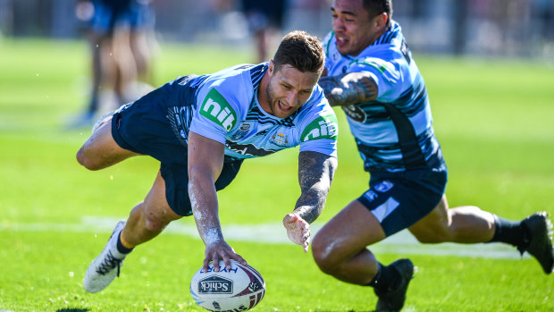 Light on his feet: Tariq Sims scores during a Blues training session in Sydney.