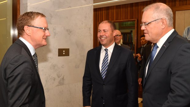 Prime Minister Scott Morrison and Treasurer Josh Frydenberg meet with RBA governor Philip Lowe four days after the election. 