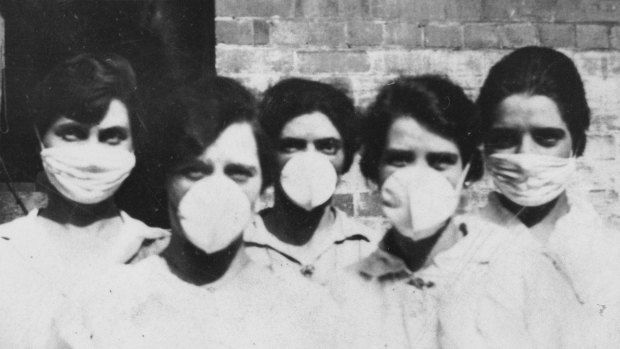 A group of volunteer women in Brisbane prepare to go door-to-door to help people afflicted with Spanish Flu in 1919