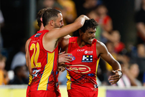 All smiles: Lloyd Johnston celebrates a goal for the Suns.