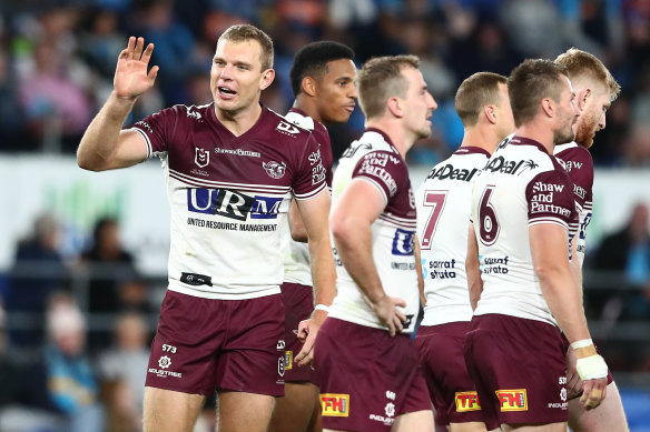 Tom Trbojevic had a hat-trick by the hour mark as Manly blew the Titans off the park after half-time.