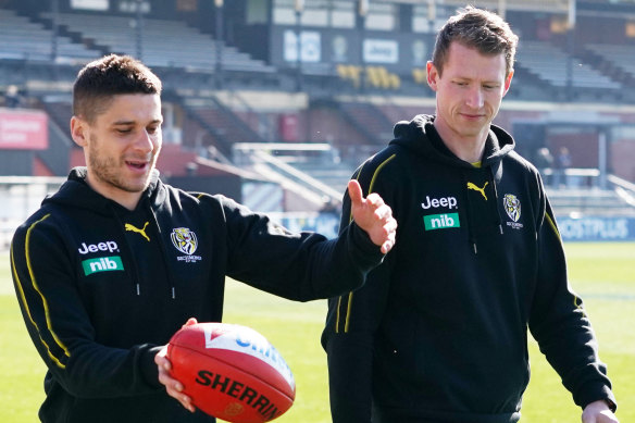 Grimes walks laps at Punt Road with Dion Prestia.
