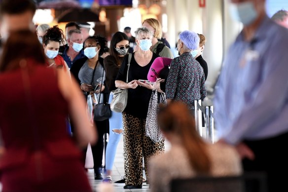 Fully vaccinated travellers have begun flying to Queensland from interstate hotspots. They will need to quarantine at home for 14 days. File photo from the Brisbane Airport. 