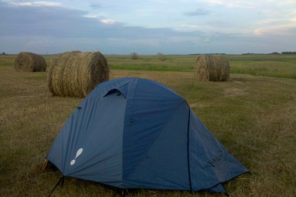 Camping in a field during his trek across the US; most people Green met gave him permission to sleep on their property. 