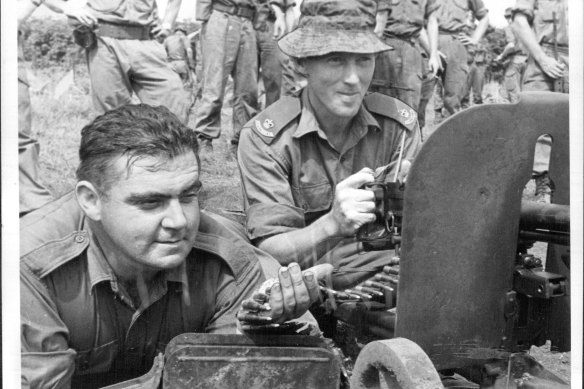 Smith (right) on the frontline in Vietnam.