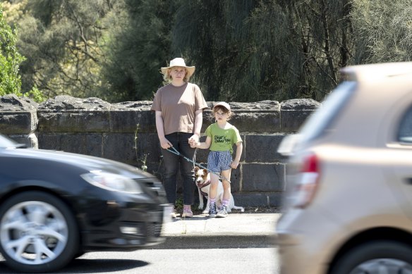 Antonia Sellbach and her six-year-old daughter Albertine and their dog Hilda attempting to cross Murray Road.