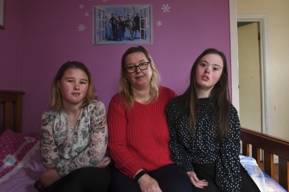 Melanie Kent with her daughters Bianca and Isabella, both of whom attend specialist schools in Frankston. 