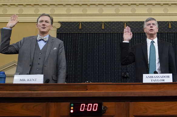 Foreign Service officer George Kent and William Taylor, the top US diplomat in Ukraine, are sworn in at the first public impeachment hearing of the House Intelligence Committee.