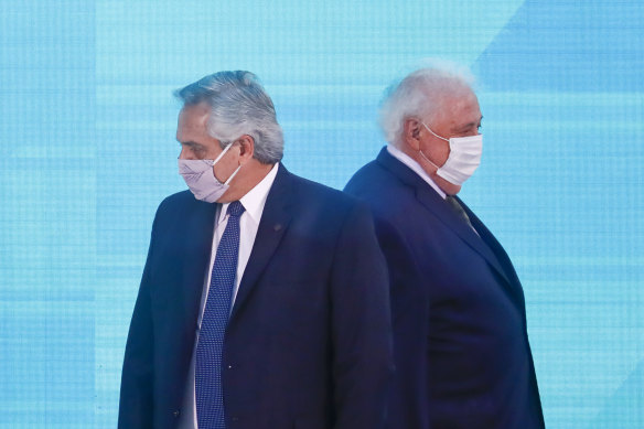 Argentine President Alberto Fernandez, left, and former health minister Gines Gonzalez Garcia. 