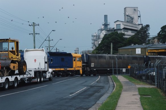 A freight train departs the Manildra mill in Bomaderry, one of the largest employers in the area.