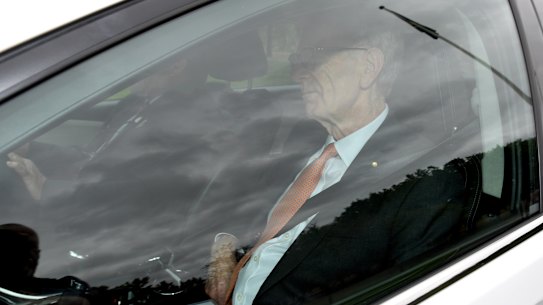 Commissioner Kenneth Hayne arrives at government house with the final report of the royal commission. 