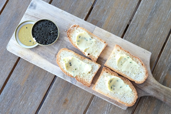 Caviar with lavishly buttered dry toasts.