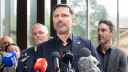 Transport Workers Union NSW assistant secretary Nick McIntosh and former Qantas employees outside the Federal Court in Sydney.