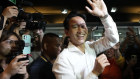 Leader of the Move Forward Party, Pita Limjaroenrat, leaves his party’s headquarters on Sunday night.