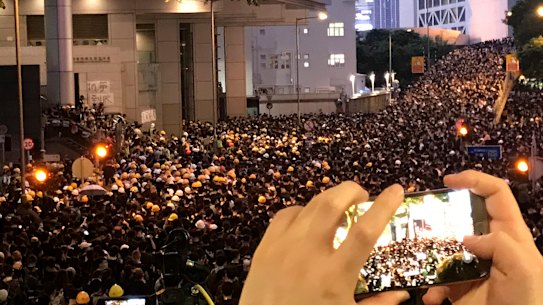 Protesters outside the Hong Kong Police headquarters on Friday.