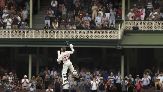 David Warner celebrates a century.