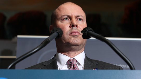 Treasurer Josh Frydenberg releasing the  2020-21 budget. New analysis points to spending remaining elevated well after the end of the coronavirus recession.