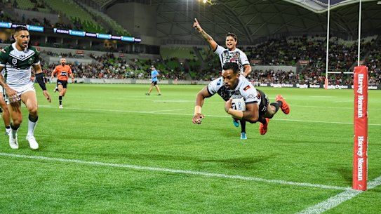 Low-flying: Josh Addo-Carr goes over for the Indigenous side.