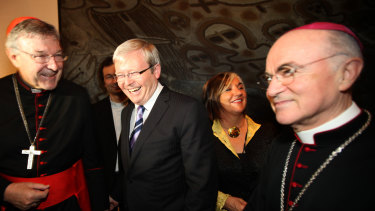 In 2010, then-Foreign Minister Kevin Rudd meets Cardinal George Pell and Cardinal Vigano at an event in Rome.
