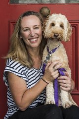 Yvette Peverell and her spoodle Libby outside their Balmain home.