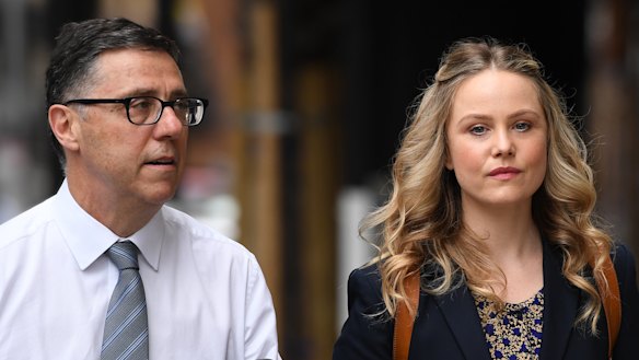 Eryn Jean Norvill and lawyer Leon Zwier arrive at the Federal Court on Friday. 