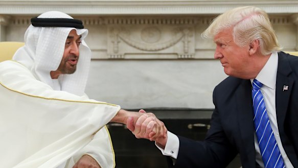 US President Donald Trump shakes hands with Abu Dhabi’s crown prince, Sheikh Mohammed bin Zayed Al Nahyan, in the White House in Washington last year.