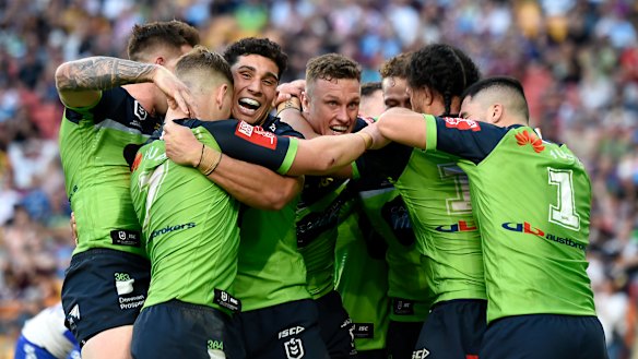 The Raiders celebrate the winning try to Sebastian Kris at Suncorp Stadium.
