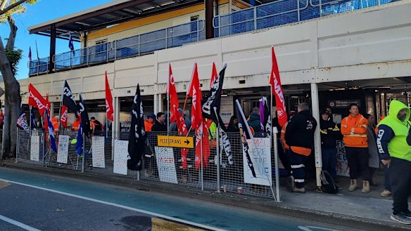 CFMEU members protest at a Cross River Rail construction site in Brisbane in July 2024.