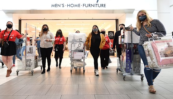 Shopping nation: US consumers kept buying things rather than spending their money in restaurants and theme parks.