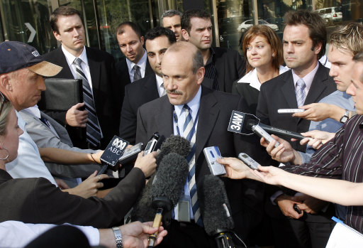 Head of Purana Gavan Ryan talks to the media after Carl Williams pleaded guilty to three murders. To the right are Michelle Kerley and Stuart Bateson. In an online tribute Ryan said of Kerley: “Her legacy is one of displaying incredible courage under relentless pressure to stop the shootings. A kind soul who loved her family, loved her team members, and provided stability in a difficult time.”
