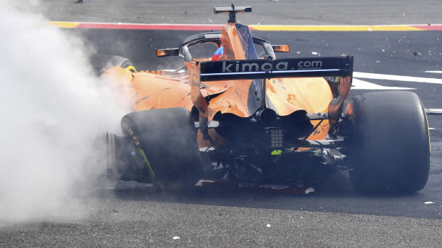 The damage to Fernando Alonso's car.