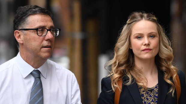 Eryn Jean Norvill and lawyer Leon Zwier arrive at the Federal Court on Friday. 