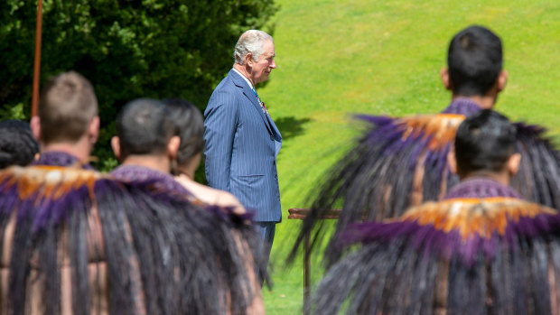 Prince Charles takes the salute as he and Camilla, Duchess of Cornwall (not pictured) attend an official welcome ceremony.