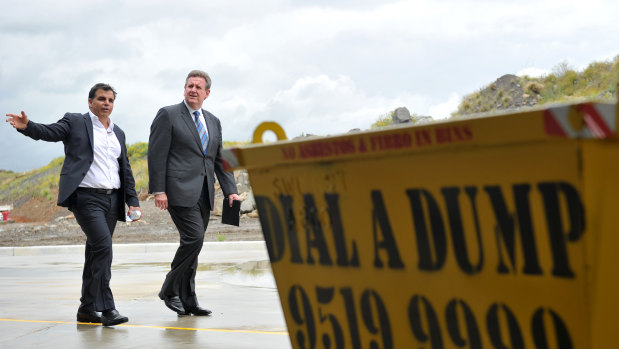 NSW Premier Barry O'Farrell and CEO of Dial A Dump Industries Ian Malouf (left) touring the city's biggest landfill site in Sydney in 2011.