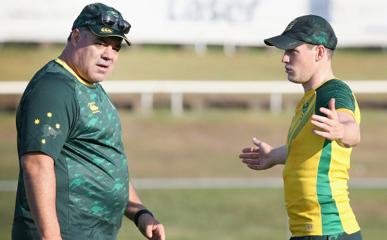 Taking his chance with both hands: Luke Keary talks tactics with coach Mal Meninga at Kangaroos training on Monday.