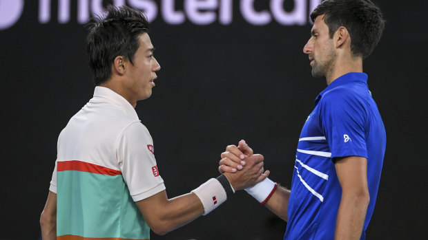 Kei Nishikori retires from his quarter-final clash with Novak Djokovic.