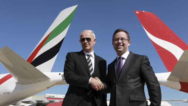 Tim Clarke and Alan Joyce, pictured first announcing the Qantas-Emirates partnership at Sydney Airport in 2012. 