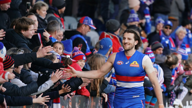 Winning grin: Dogs fans are delighted by their recent run of form.