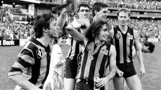 Long-term effects: John Platten with the premiership cup, right, in 1986. He is among a group of ex-players preparing for litigation. 