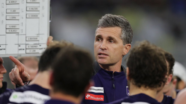 Justin Longmuir addresses the team during a game in his rookie season as Dockers coach.