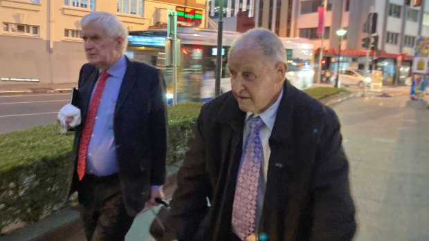 Frank Terrence Keating (right) leaves Brisbane Magistrates Court with lawyer Terry O’Gorman (left).