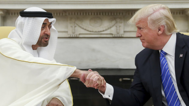 US President Donald Trump shakes hands with Abu Dhabi’s crown prince, Sheikh Mohammed bin Zayed Al Nahyan, in the White House in Washington last year.