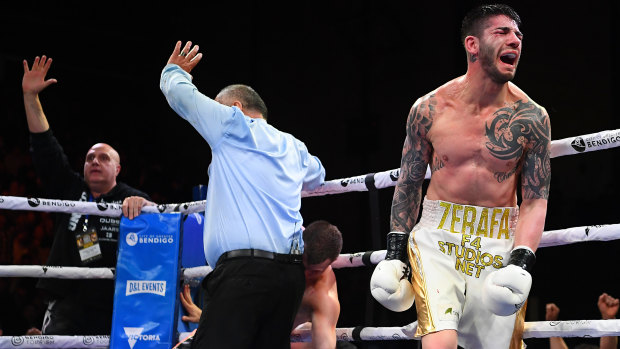 Down for the count: The referee steps in to stop the bout after Michael Zerafa downed Jeff Horn in the ninth round.