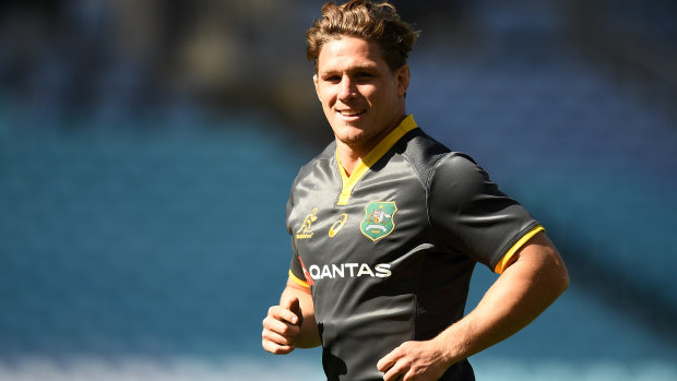 Follow me, boys: Michael Hooper leads the way at the captain's run at ANZ Stadium on Friday. 