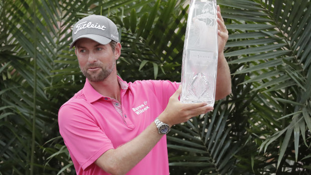 Webb Simpson with The Players Championship trophy.